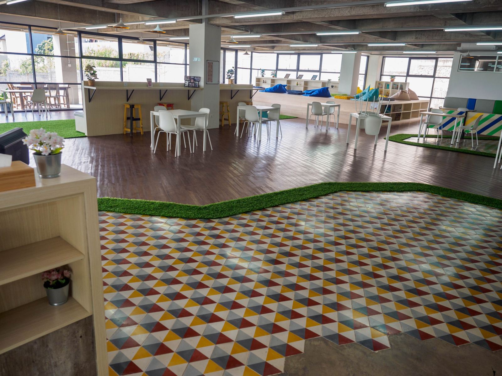 Shelves and reading tables in the Kota Baru Parahyangan library