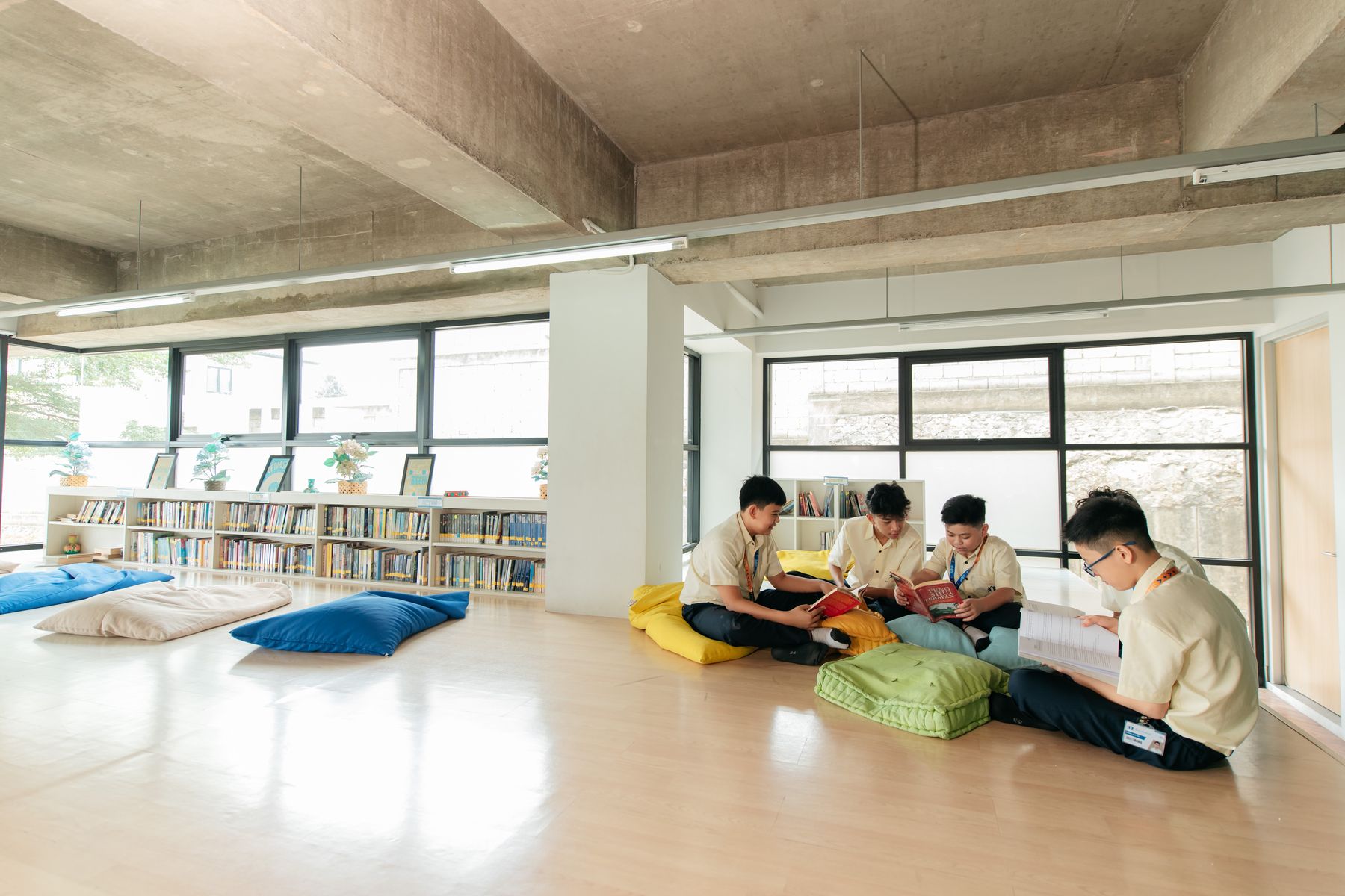 Secondary students reading in the library